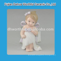 Beautiful little white porcelain angel figurine for wholesale